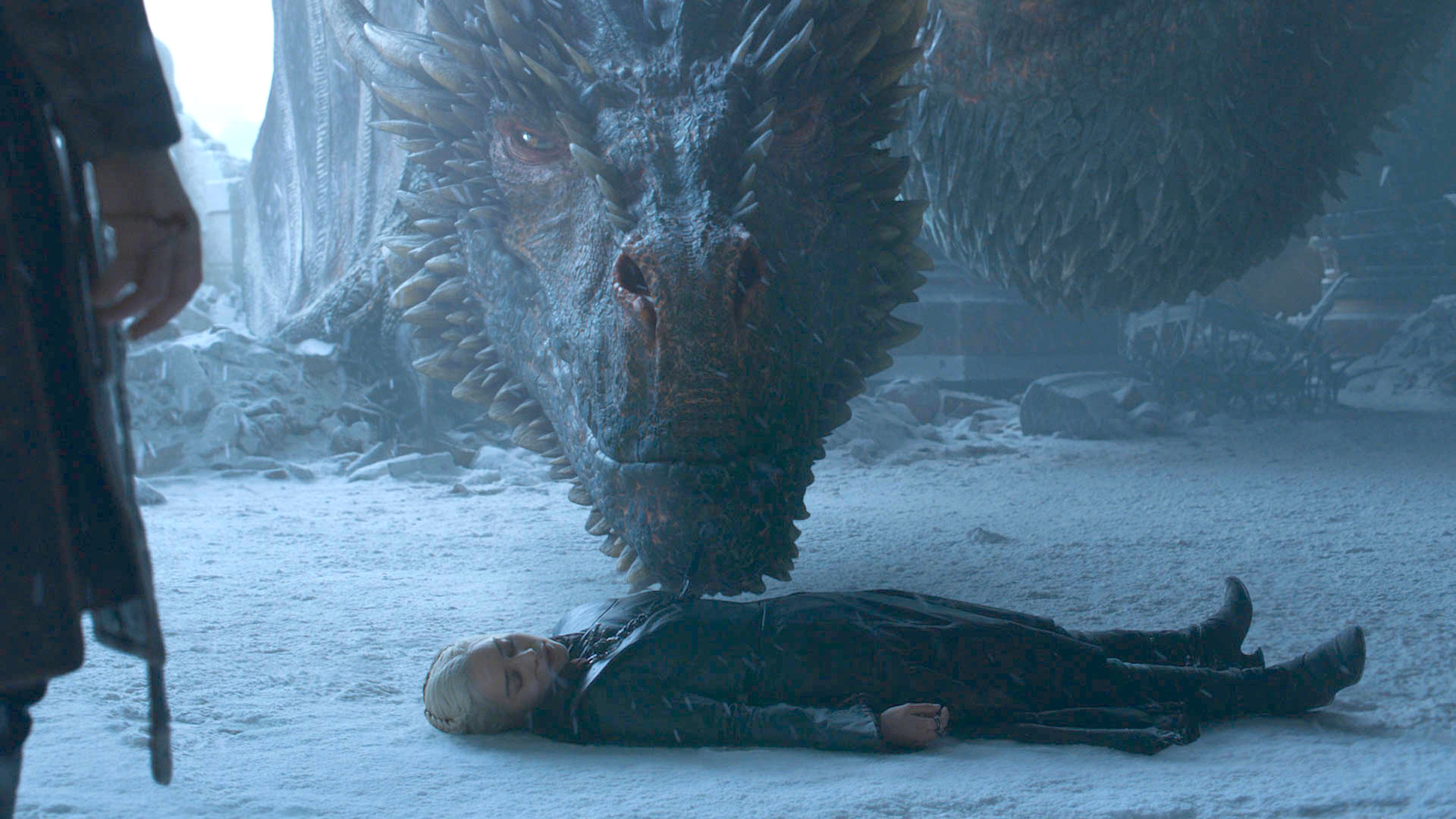 Drogon beside a fallen Daenerys
