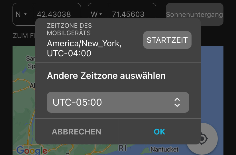 Wenn Sie auf „Zeitzone auswählen“ tippen, werden in einem neuen Fenster die „Zeitzone Ihres Mobilgeräts“ sowie eine Schaltfläche „Festlegen“ angezeigt. Über das Dropdown-Menü „Andere Zeitzone auswählen“ können Sie manuell eine andere Zeitzone auswählen.