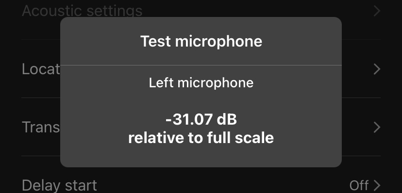 The Test Microphone window displays a level reading for each attached microphone in decibels (dB).