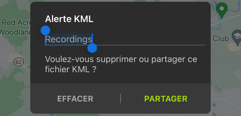 Boîte de dialogue « Alerte KML » : un champ de texte modifiable affiche le nom de fichier KML par défaut, « Enregistrements ». Ci-dessous, un message indique : « Voulez-vous supprimer ou partager ce fichier KML ? » Au bas de la boîte de dialogue se trouvent les boutons SUPPRIMER et PARTAGER.