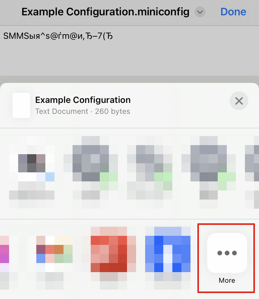In the iOS sharing interface, the "Example Configuration" file is listed as a Text Document.