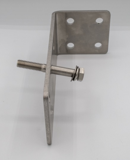 The washers and bolt head should be on the interior face with respect to the bend in the mounting bracket.